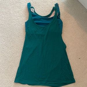 Deep green Small Lululemon workout shirt with built in sport bra.